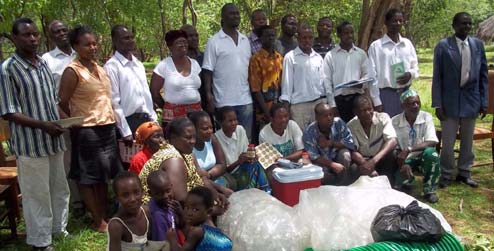 Beekeepers with some of their equipment